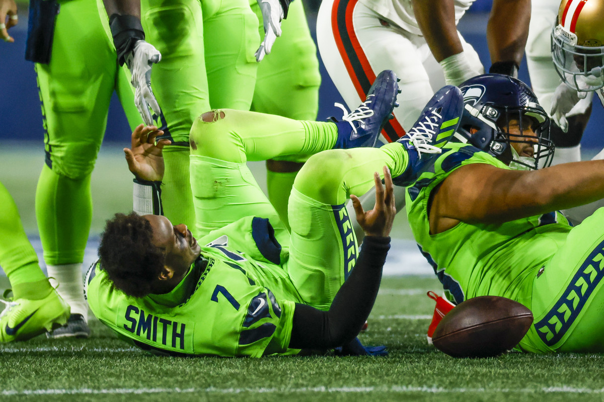 Seattle Seahawks quarterback Geno Smith (7) reacts following a sack by the San Francisco 49ers during the fourth quarter at Lumen Field.